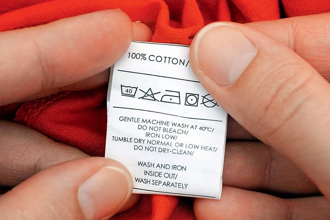 Значение зачеркнутого треугольника на одежде Значение зачеркнутого треугольника на одежде