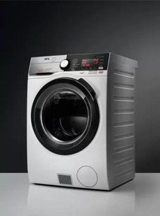 Стирально-сушильная машина АЕГ L9WBCN61B фото 2 Стирально-сушильная машина AEG L9WBCN61B фото 2