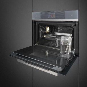 Компактный духовой шкаф с пароваркой Smeg SF4104WVCPS фото 2