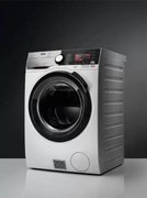 Стирально-сушильная машина AEG L9WBCN61B фото 2