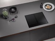Индукционная панель конфорок с сенсорным управлением Miele KM7564 FL фото 3