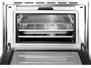 Компактный духовой шкаф с пароваркой Smeg SF4750VCBS фото 3