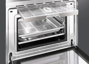 Компактный духовой шкаф с пароваркой Smeg SF4920VCB фото 3