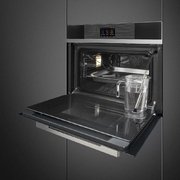 Компактный духовой шкаф с пароваркой Smeg SF4104WVCPN фото 2