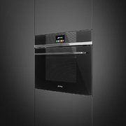 Компактный духовой шкаф с пароваркой Smeg SF4104VCN фото 2