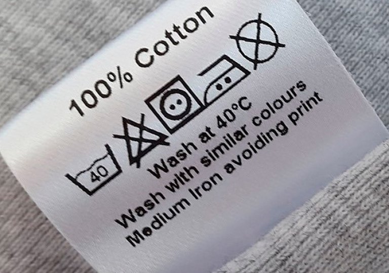 Значение зачеркнутого треугольника на одежде Значение зачеркнутого треугольника на одежде